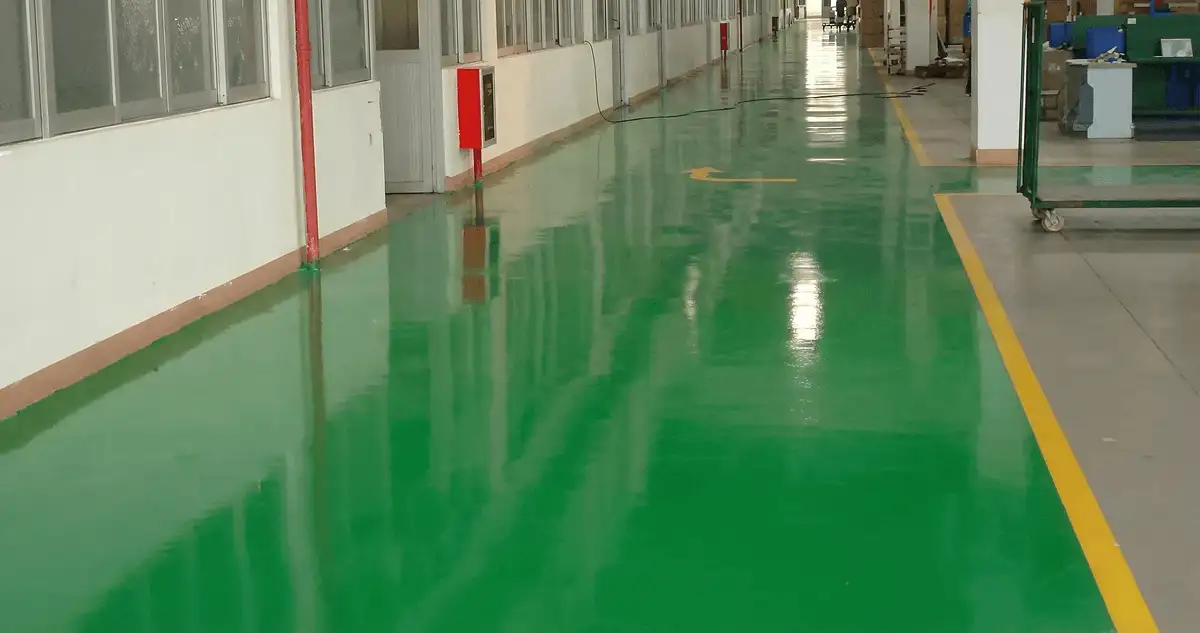 A factory floor professionally covered and marked with epoxy flooring in Des Moines, IA