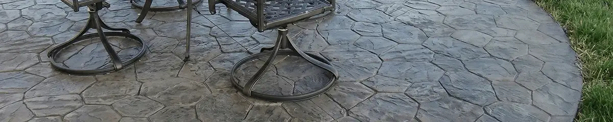 Garden relaxation area with professionally installed stone flooring in Des Moines IA